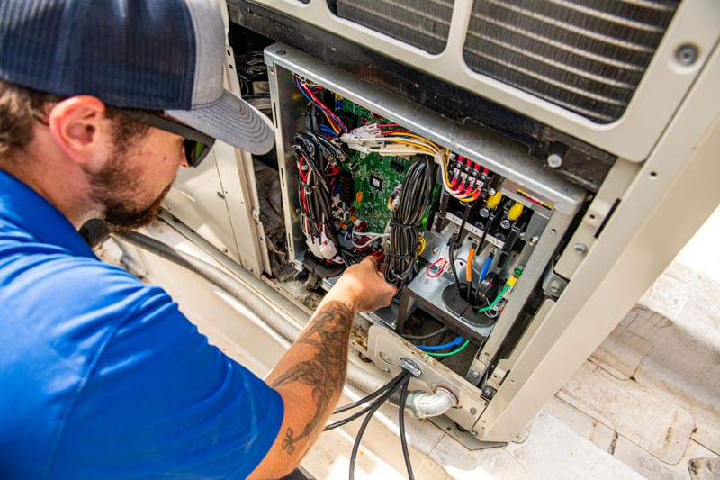 HVAC technician performing commercial HVAC services